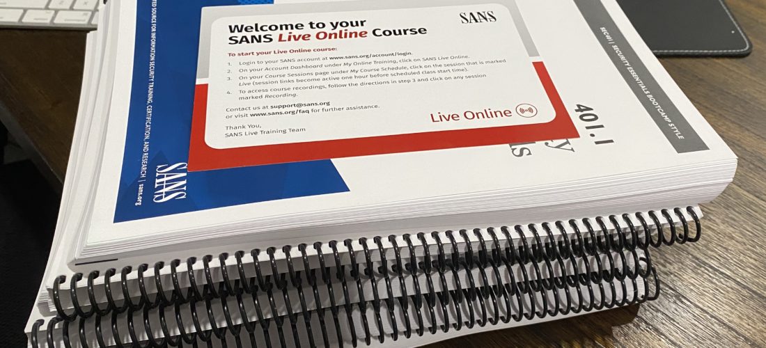 a photo of a stack of 7 spiral-bound workbooks